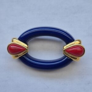 Vintage blue, red and gold plastic brooch